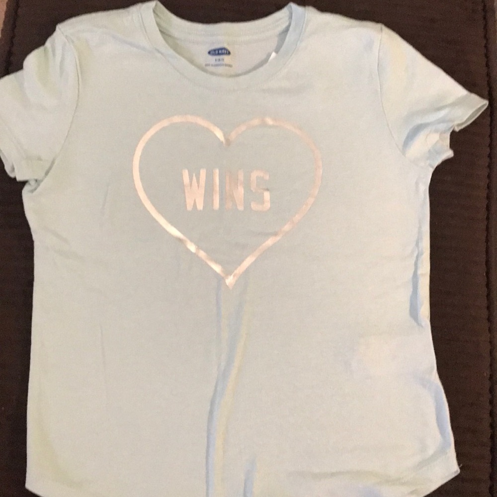 Girls light blue shirt sleeve T-shirt.